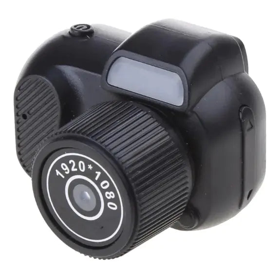 Retro mini camera with vintage design, compact and easy to carry for casual photography.