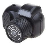 Retro mini camera with vintage design, compact and easy to carry for casual photography.