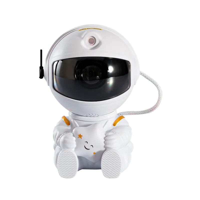 Astronaut LED star projector night light and desk lamp, creates a galaxy effect for bedrooms or relaxation spaces.