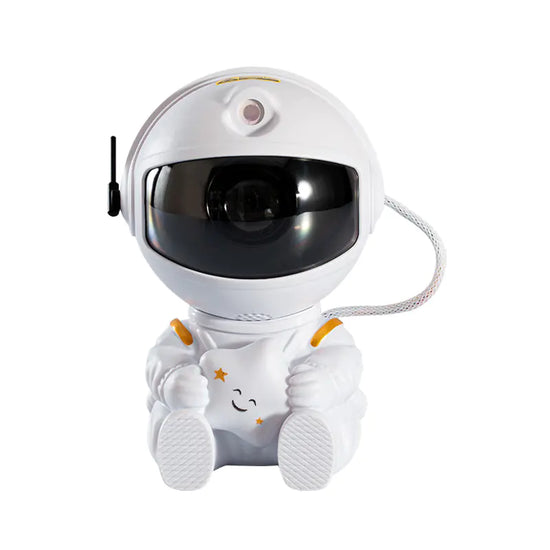 Astronaut LED star projector night light and desk lamp, creates a galaxy effect for bedrooms or relaxation spaces.